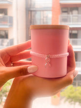 Load image into Gallery viewer, Soy wax 7 oz candle with charge pink ribbon bracelet ￼
